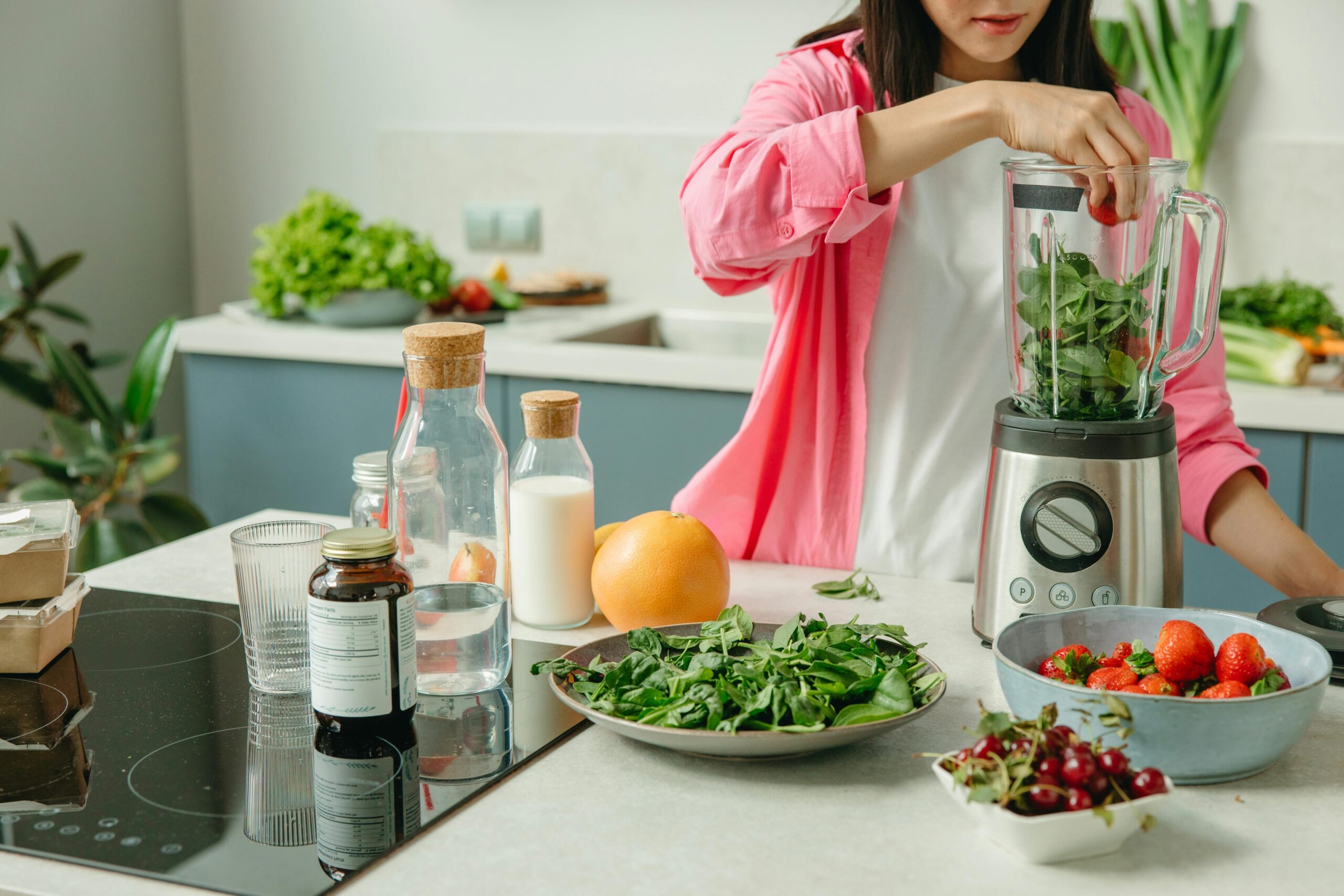 A green smoothie made with spinach, banana, and almond milk