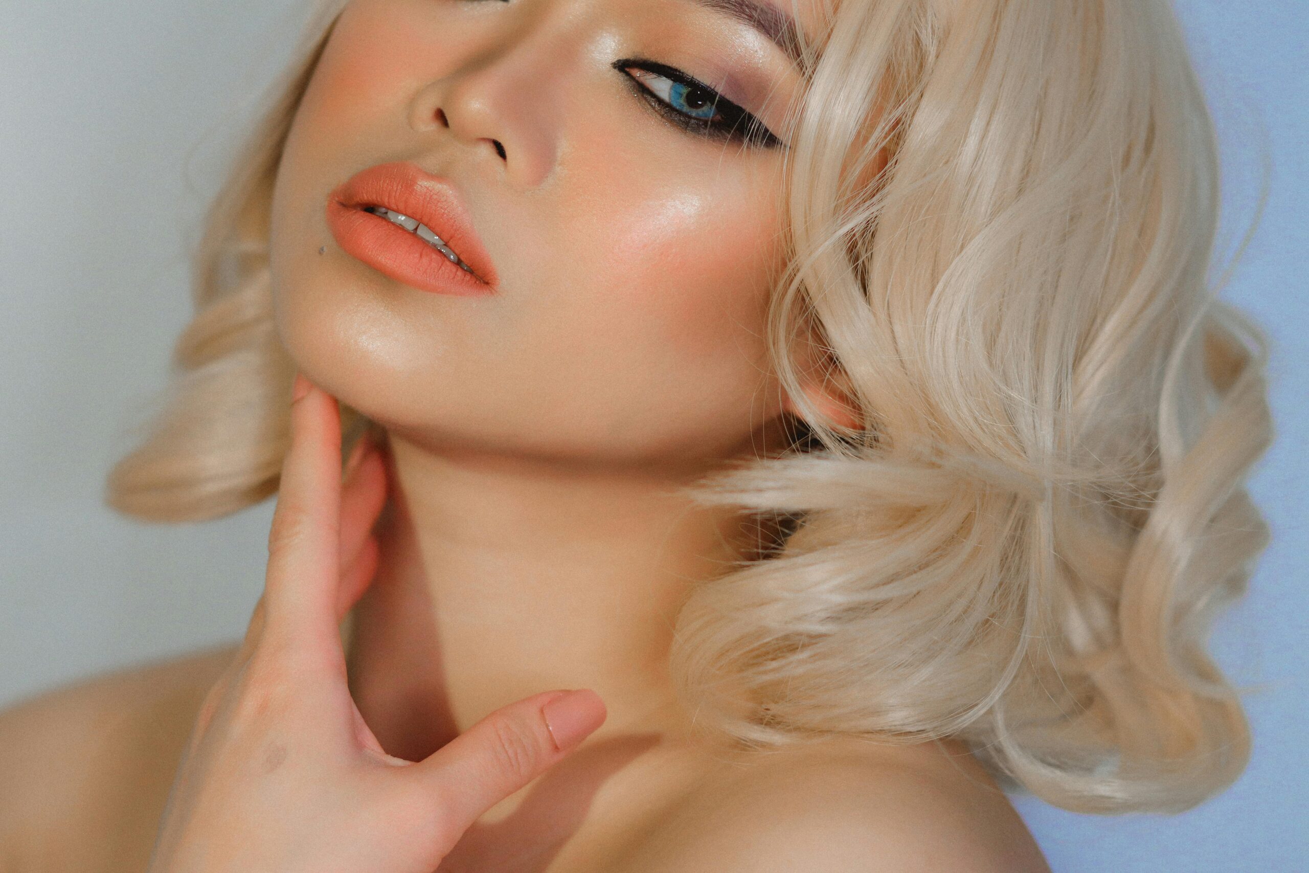 A closeup shot of glowing skin with dewy highlights