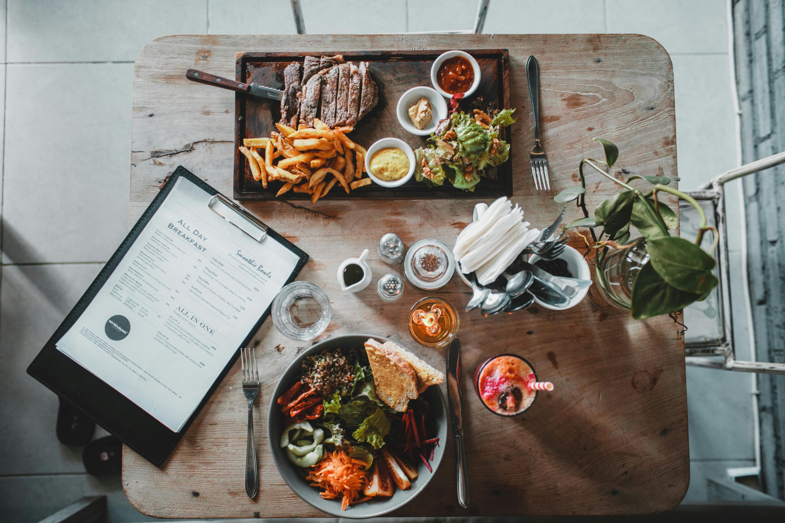 A colorful array of organic vegetables on a wooden table