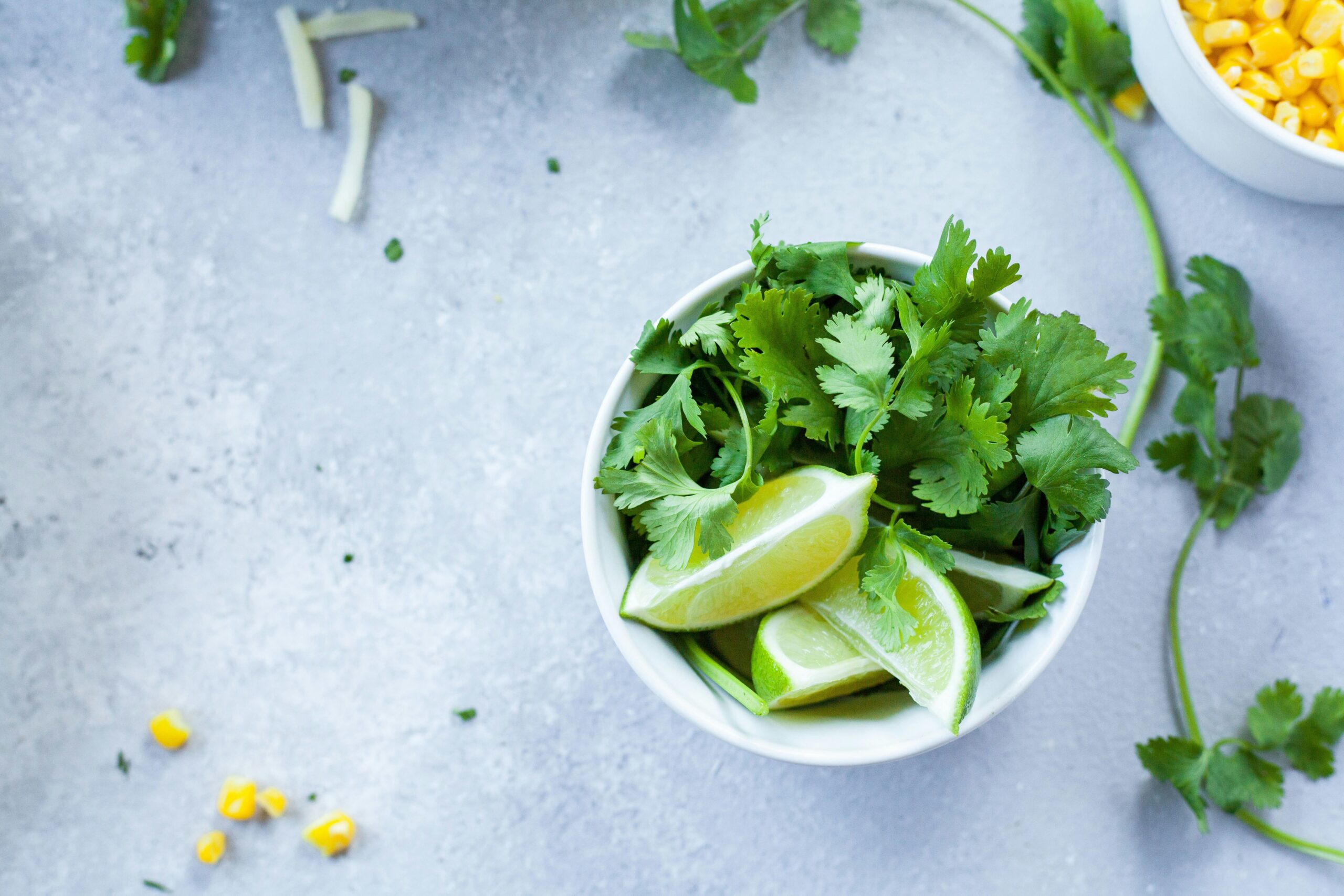 DIY skincare ingredients including cucumber slices, avocado halves, and honey drizzle