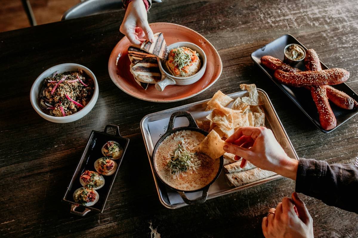 people sharing gourmet appetizers