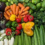 a variety of vegetables are arranged on a table