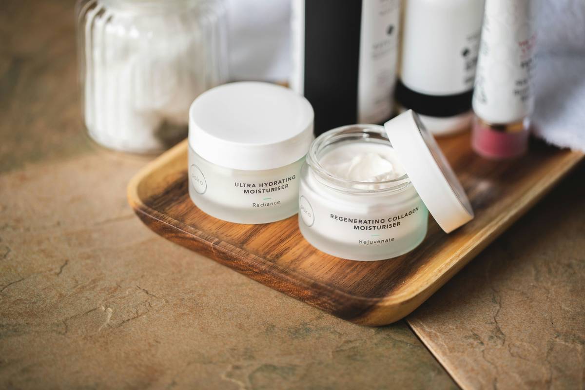 Skincare products on bathroom shelf